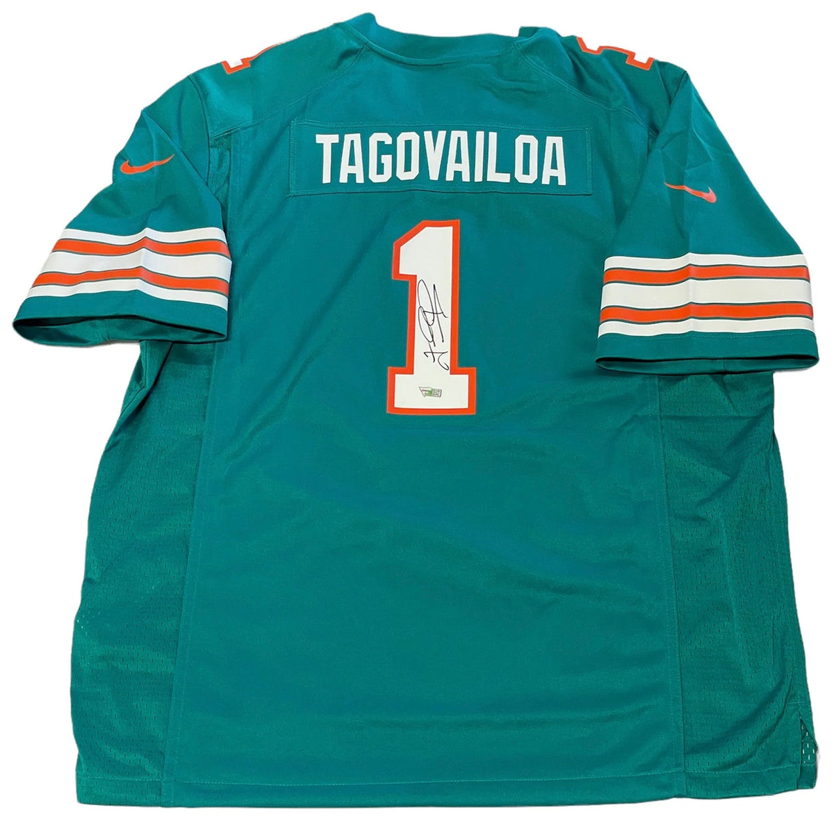 Tua Tagovailoa Autographed Dolphins Throwback Jersey (Fanatics) product image 1, provided for visual reference and product