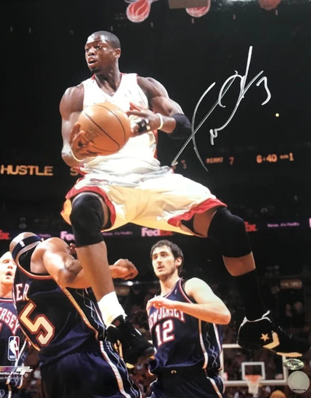Dwyane Wade Autographed Over Vince Carter 16x20 Photo product image 1, provided for visual reference and product detail