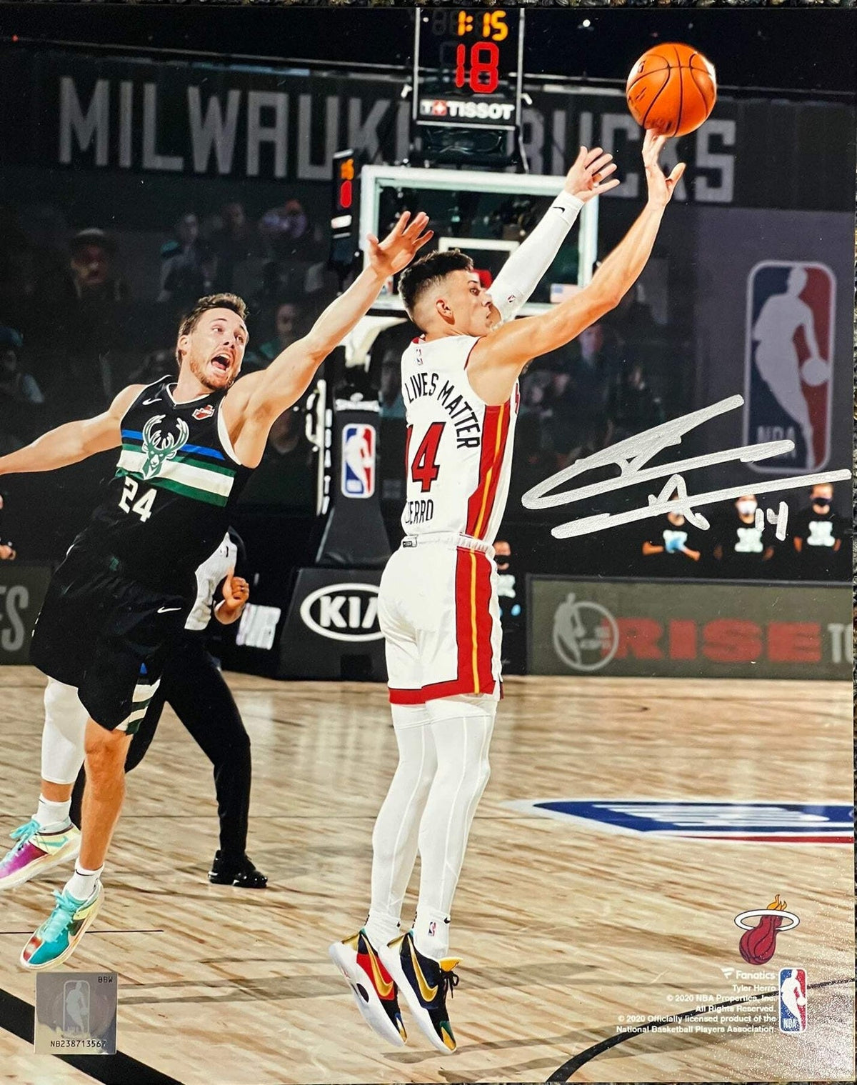 Tyler Herro Autographed Shooting 8x10 Basketball Photo (JSA) product image 1, provided for visual reference and product