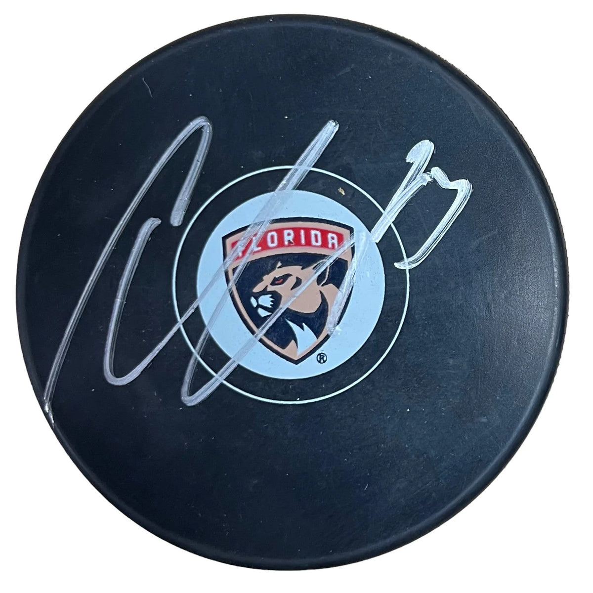 Carter Verhaeghe Autographed Panthers Puck (JSA) product image 1, provided for visual reference and product detail review