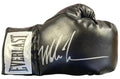 Mike Tyson Autographed Black Everlast Right Boxing Glove (JSA) product image 1, provided for visual reference and product